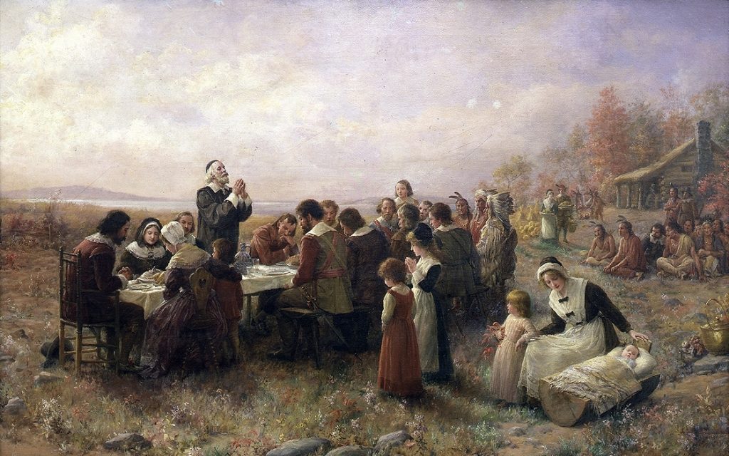 Obraz First Thanksgiving autorstwa Jennie Augusta Brownscombe Opublikowano na licencji CC0 1.0, via Creative Commons